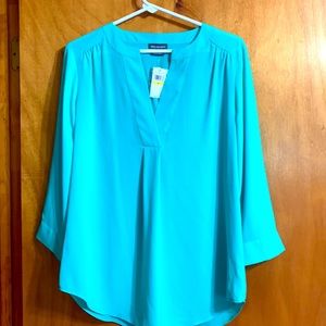 van Heusen woman’s dressy top new with tags. Color is teal size M long sleeve
